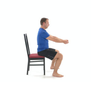 man using chair for physical therapy sit stand exercise - sitting